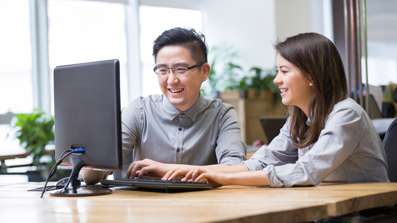 A man talking to his teammate; image used for IPO page