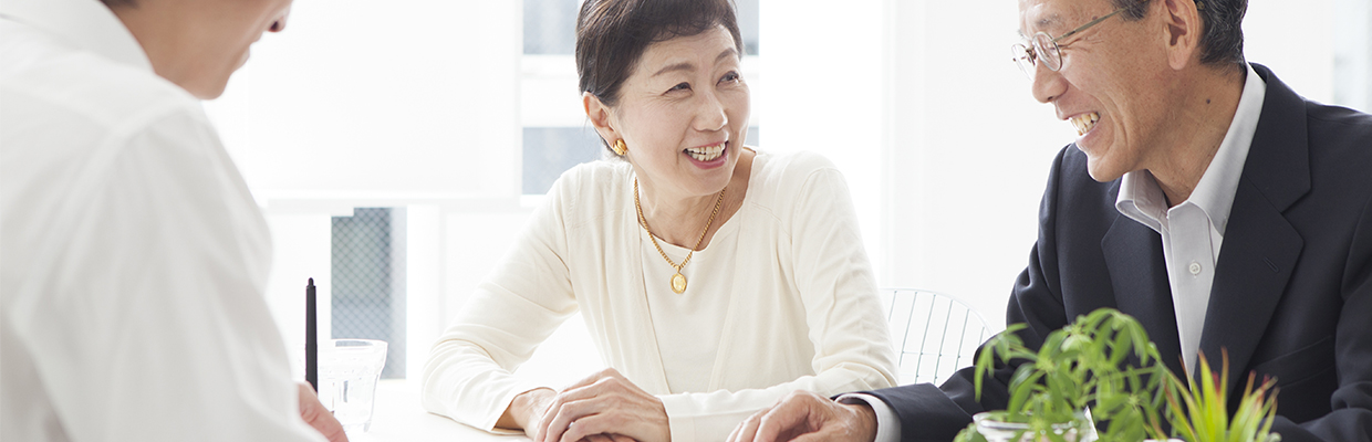 A man is chatting happily with his wife; image used in CIES